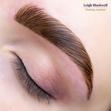 Online brow course showing students how to apply tinted liquid stain for bold, long-lasting brow definition.